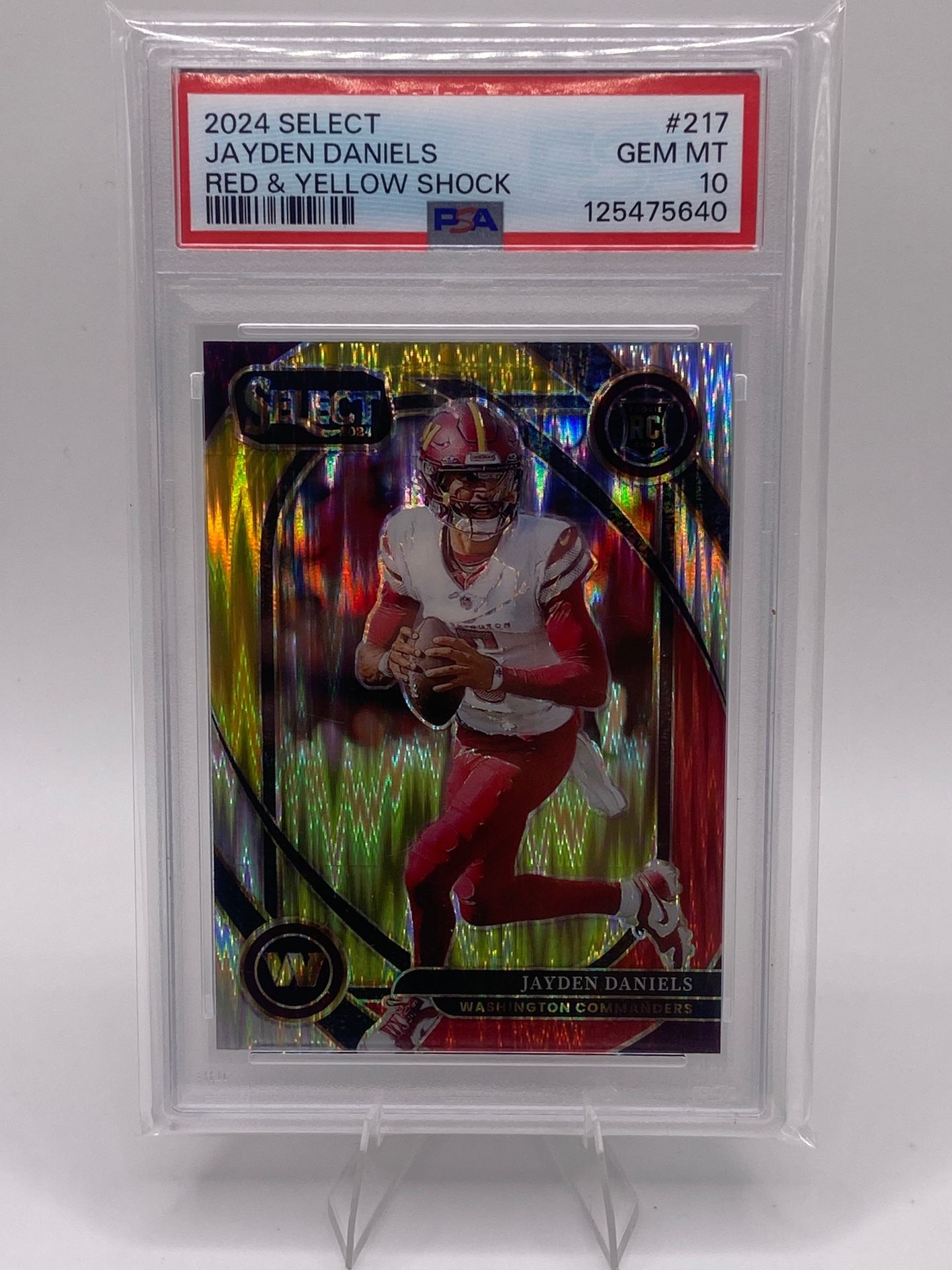 Jayden Daniels Select Red & Yellow Shock RC PSA 10 - $125