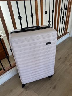 Light weight travel luggage spinner Jessica Simpson light pink