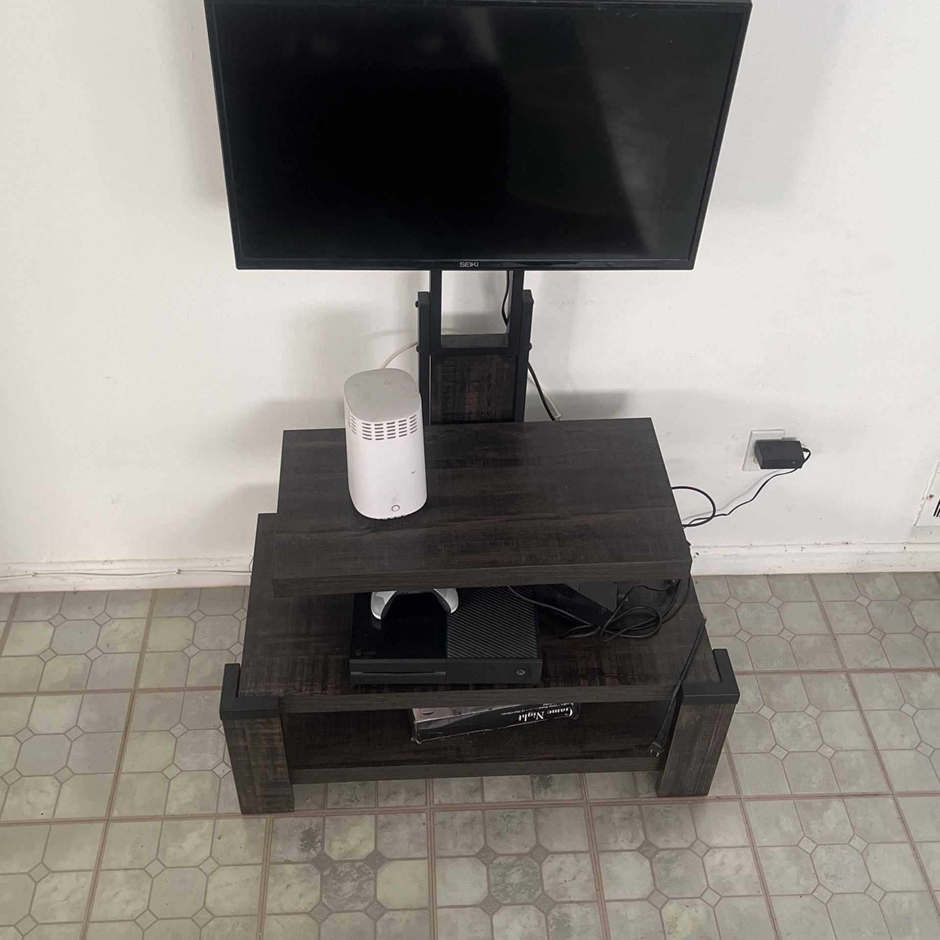 Tv Stand With tv And Xbox One Console 