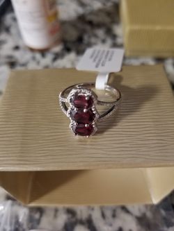 2.10ctw Oval Raspberry Color Rhodolite Rhodium Over Sterling Silver Ring size 7