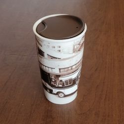 Starbucks 2016 Ceramic First Store/Truck Tumbler 12 oz Seattle Pike 
Place. Pre-owned, very good shape, no chips or cracks. 6" tall.  Weight 
1lb plus