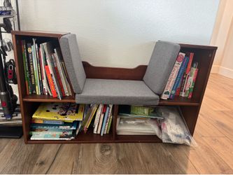 Bookcase with reading nook includes all the books
