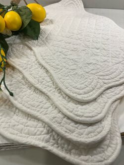 White quilted cloth placemats