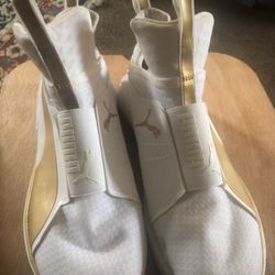 PUMA White And gold Slip Ins. Size 6.5Y