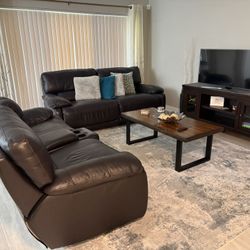 Two Reclining Brown Leather Couches