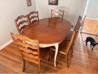 Antique walnut extendable dining table and 6 solid wood chairs