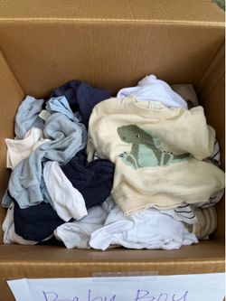 Box of baby boy clothes
