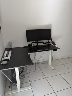 L-Shaped Electric Standing Desk – Black Top, White Frame