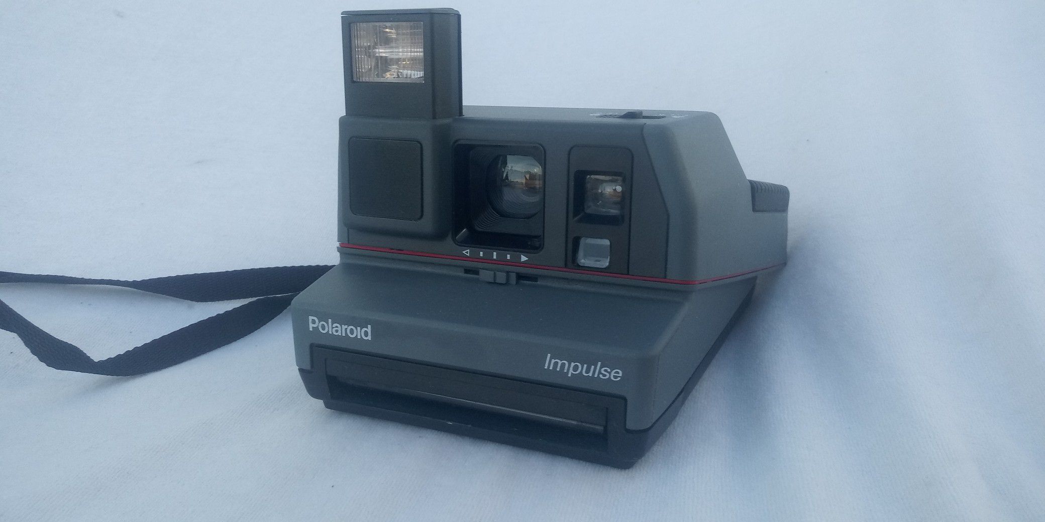 Polaroid impulse camera