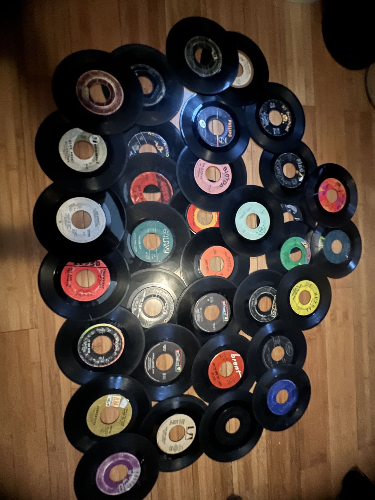 34 Count of Assorted 45 RPM Vinyls READ DESC