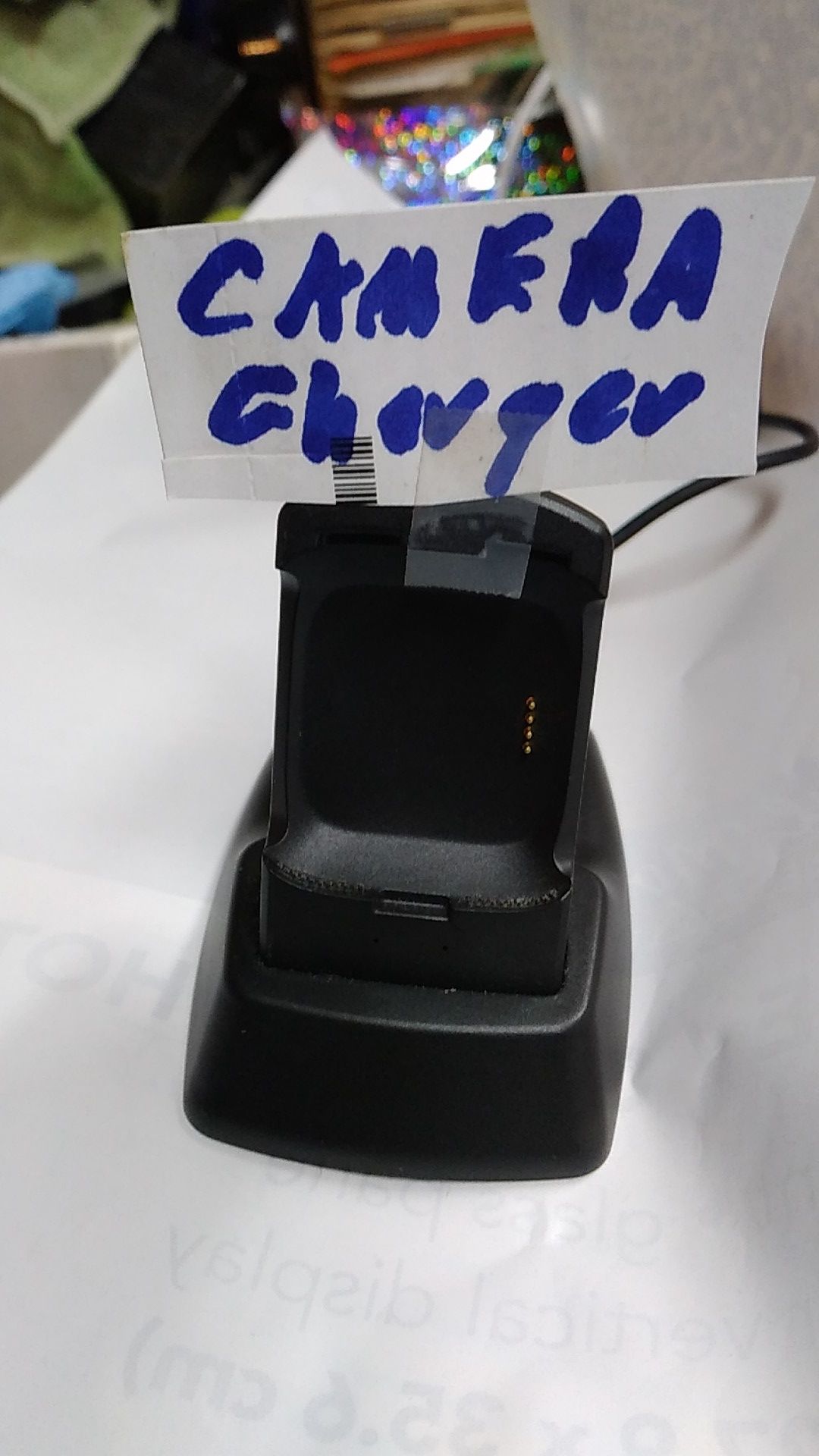 Camera battery charger