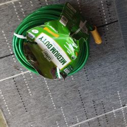100 Foot Gargen Hose  New Never Used