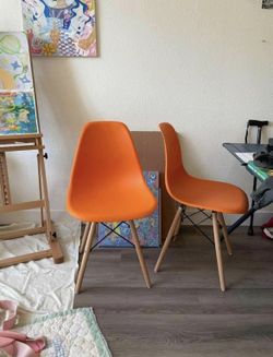 4 eames style chairs
