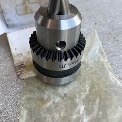 Fixed drill bit