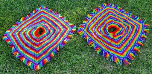 Vintage crocheted rainbow ponchos