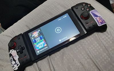 Original Nintendo switch with Hori split pad pro.