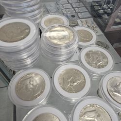 BU Franklin and 1964 Kennedy  half dollar