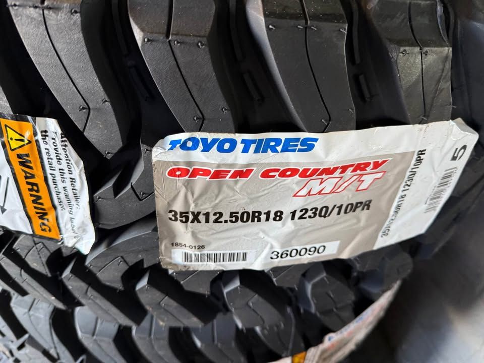 (4) 35x12.50R18 Toyo Open Country MT Free install