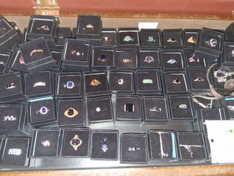 lots of jewelry rings earrings necklaces
