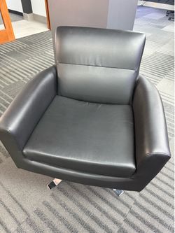 Swivel faux leather chair
