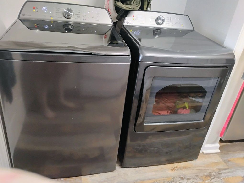 GE Profile top loading washer and front loading dryer, sell as a set only. Serious inquiries only
