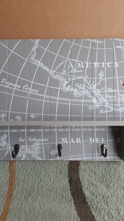 Globe style shelf with hooks