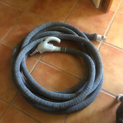 Almost new 35 foot vacuum cleaner hose with on and off switch