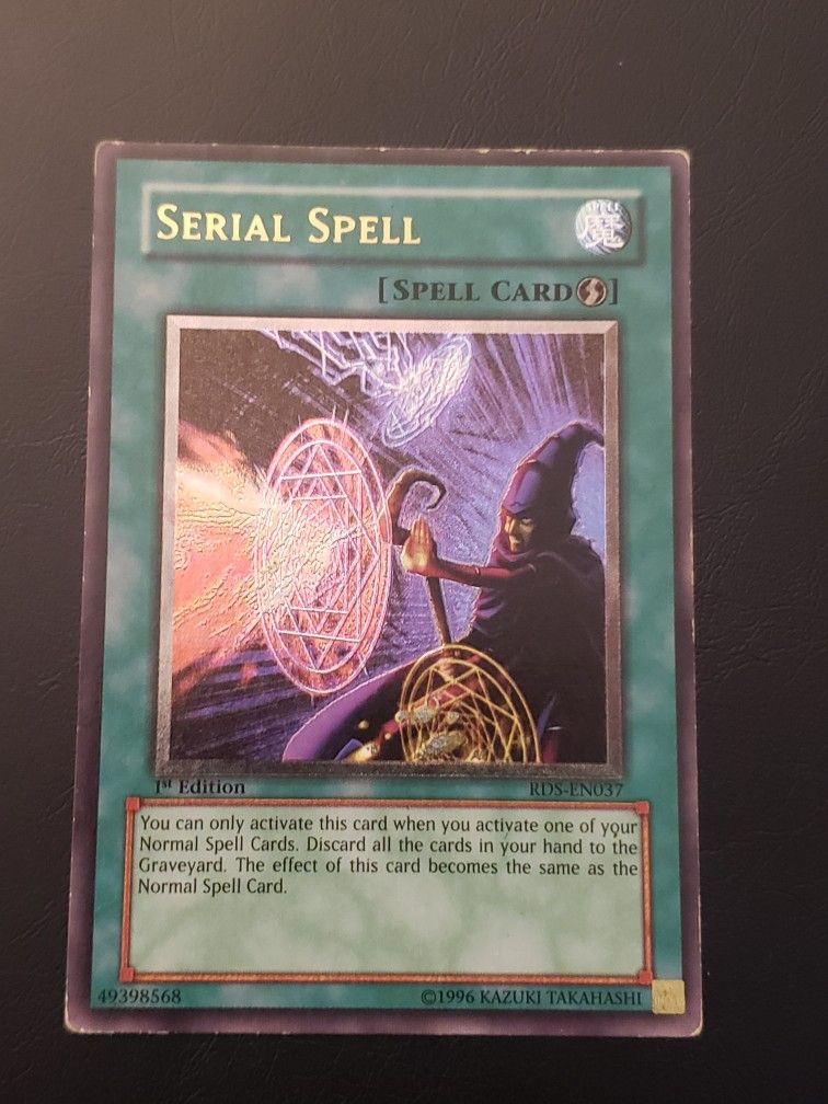 Yugioh Serial Spell Ultimate Rare Light Play