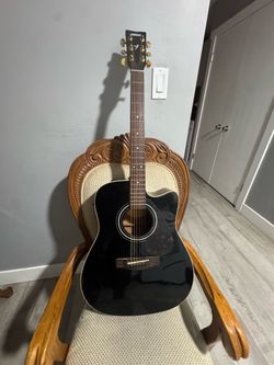 Yamaha Black Acoustic-Electric Cutaway Guitar
