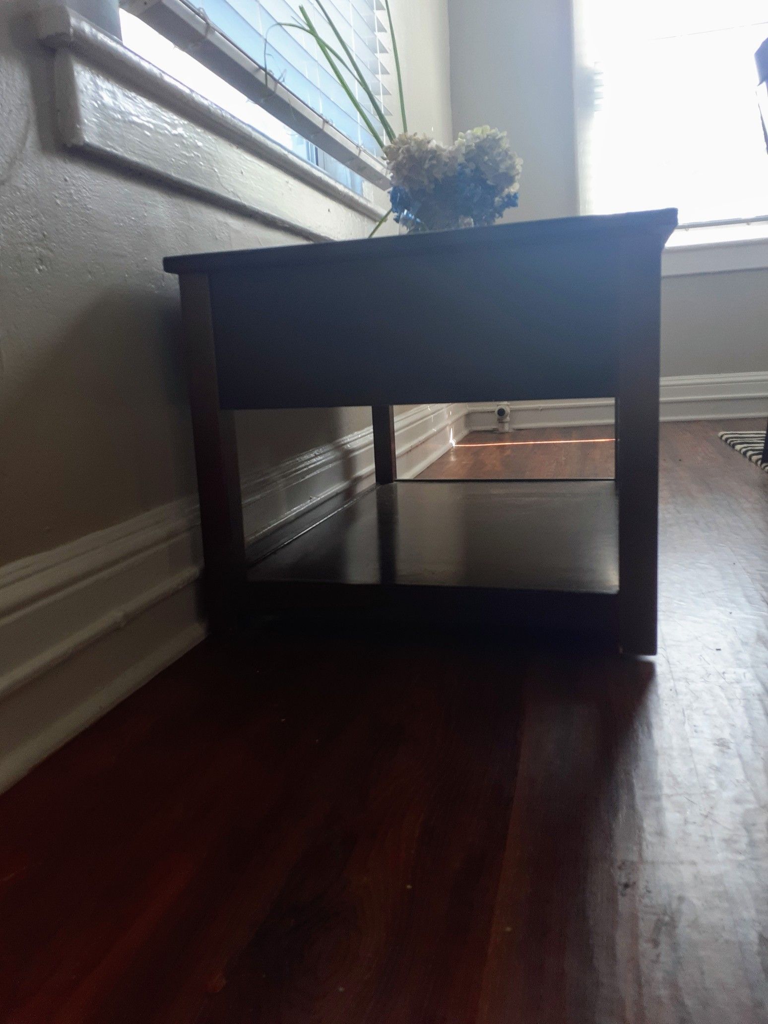 Walnut stained lift-top coffee table