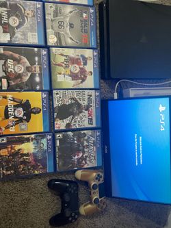 ps4 slim 1 tb with 2 controllers and 15 games