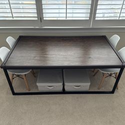 Table, chairs, and storage bins for kids