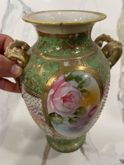 Victorian-era Nippon with intricate raised gold beadwork.