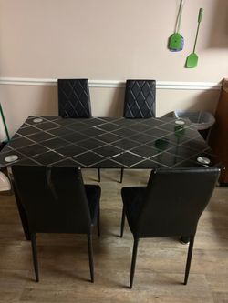 Black Glass Dining Table + 4 Chairs – $250