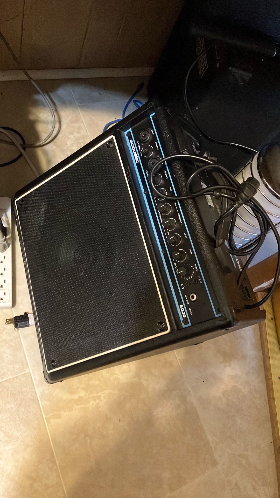 Acoustic guitar amps 2 chanels 1 aux in for guitar mic and aux that can be used for phone or drum box