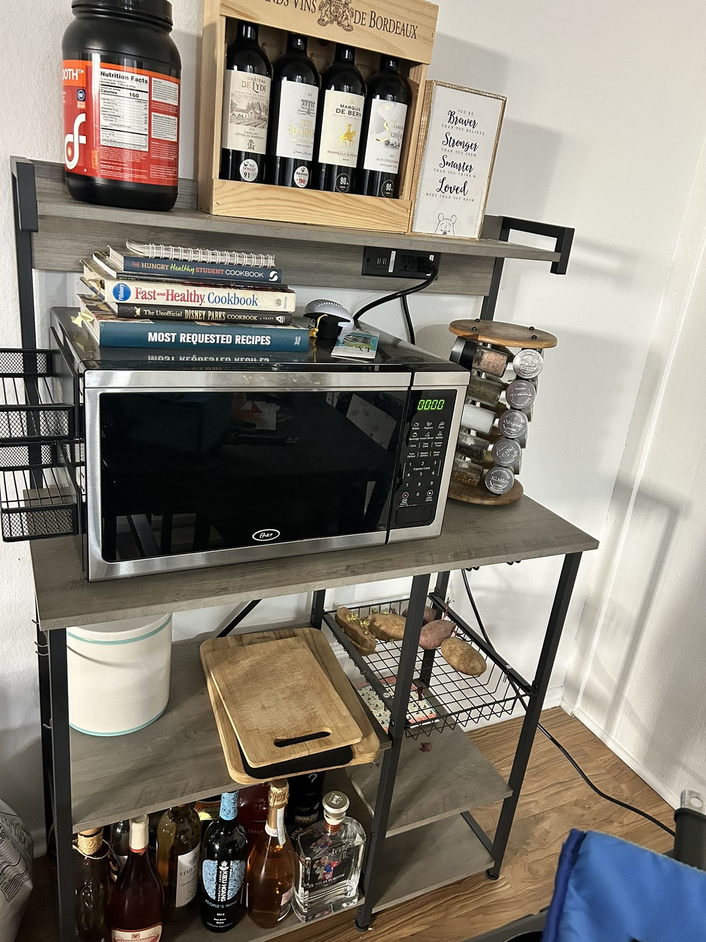 SUNLEI Kitchen Bakers Rack with Power Outlet, Large Microwave Stands Cart with 6 S-Shaped Hooks, Coffee Bar Cabinet, Kitchen Cart with Wine Glass Hold