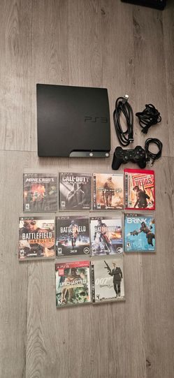 Playstation 3 slim with 10 Playable games