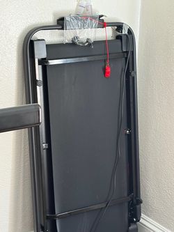 Folding walking pad with hand rail