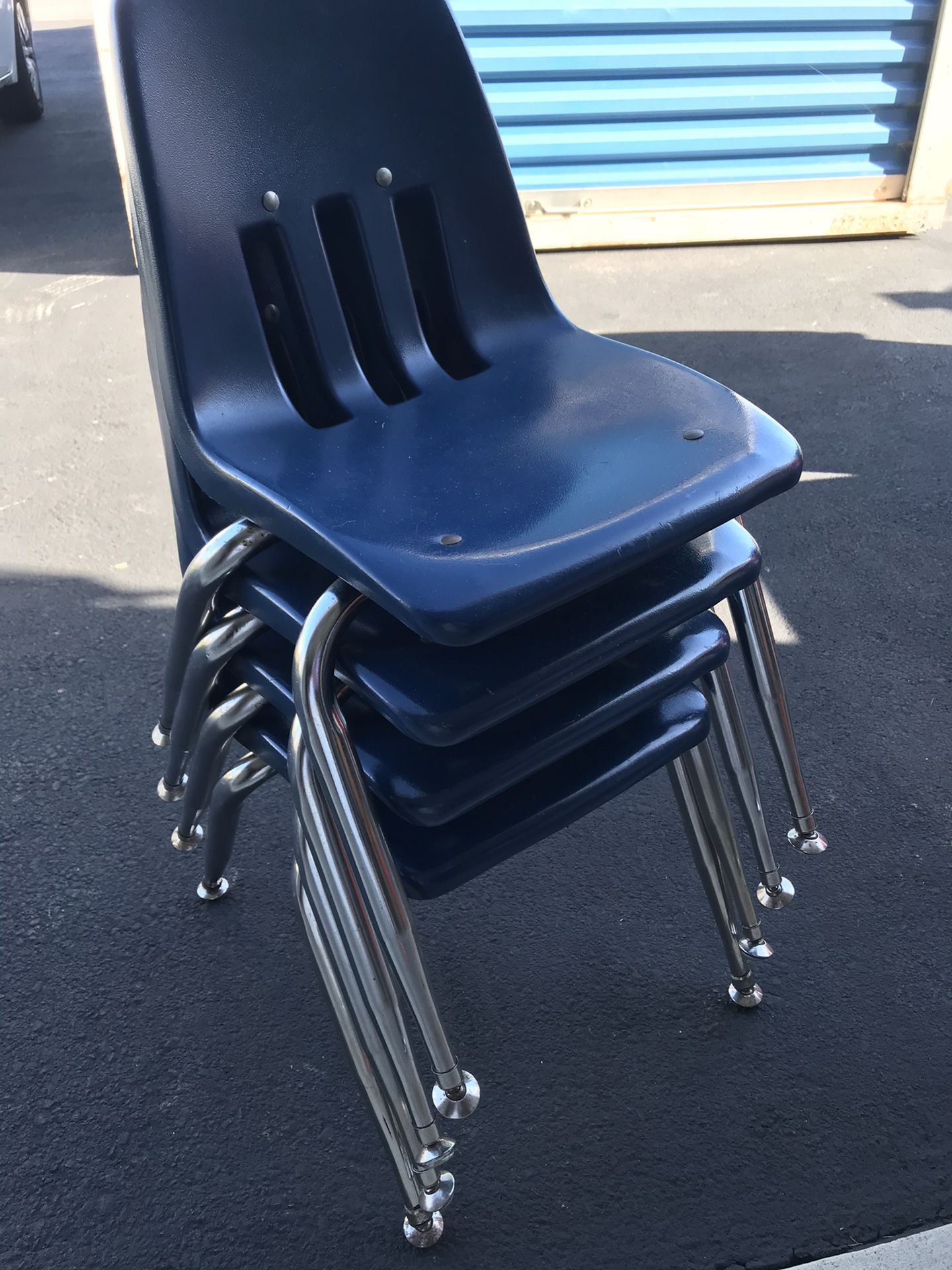 Stacking plastic kids chairs
