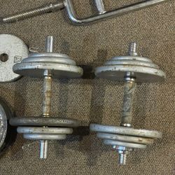 Vintage 70 pound Adjustable Dumbells