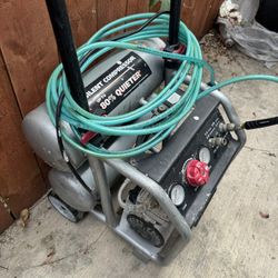 Used Husky - 4.5 Gal. 175 PSI Portable Electric Oil-Free Air Compressor with husky Compressor hose.