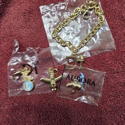 Gold Tone Charms and  Bracelet