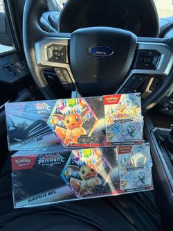 Pokémon Surprise Box + Booster Bundle Prismatic Evolution