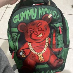 green spray ground backpack 