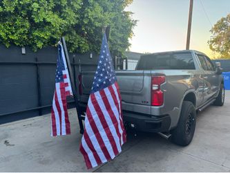 Dual flag holder for truck hitch