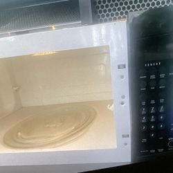 Whirlpool Large Counter (Over The Range)Microwave In Good Working Condition Price Reduced Asking $75.Obo 