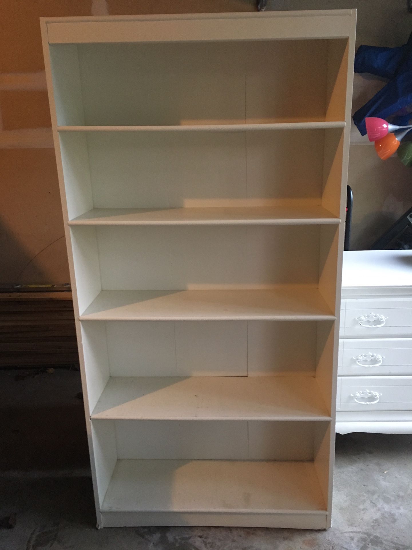 White solid wood bookcase/ shelf.