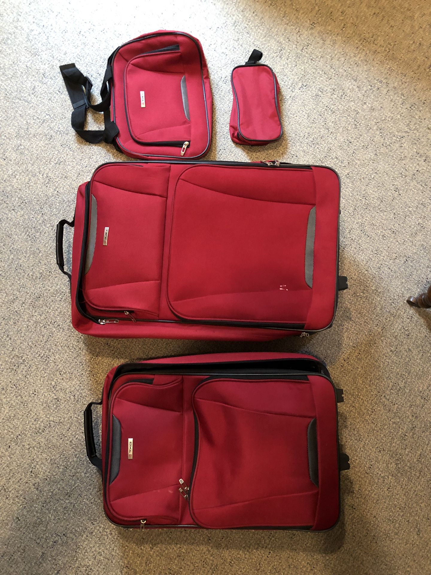 4 piece set of rolling Tag luggage