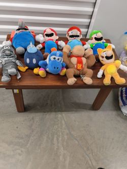 9 collectible Super Mario Bros plush toys in very good condition.