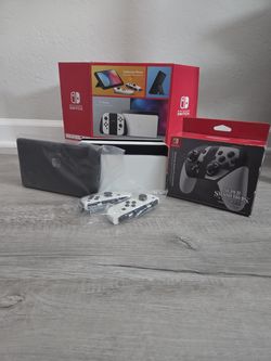Nintendo Switch – OLED Model w/White Joy-Con + Super Smash Bros. Pro Controller
